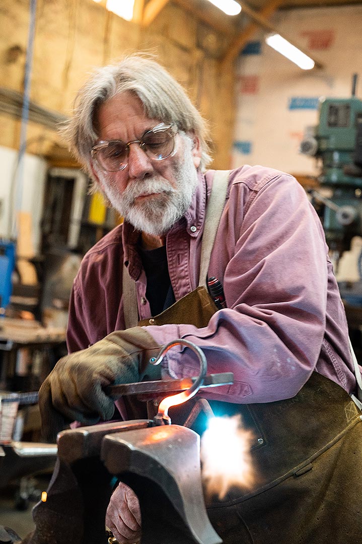 Gilmore, blacksmith, Montana Circle of American Masters, making fireplace tools